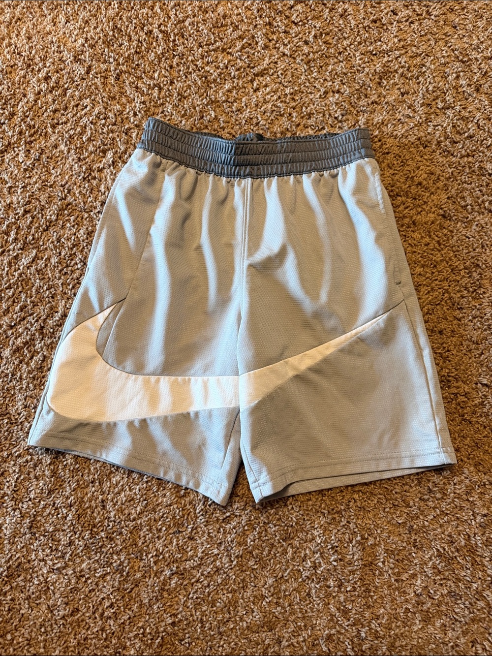 Nike Boy’s Light Gray Athletic Shorts with White Swoosh
